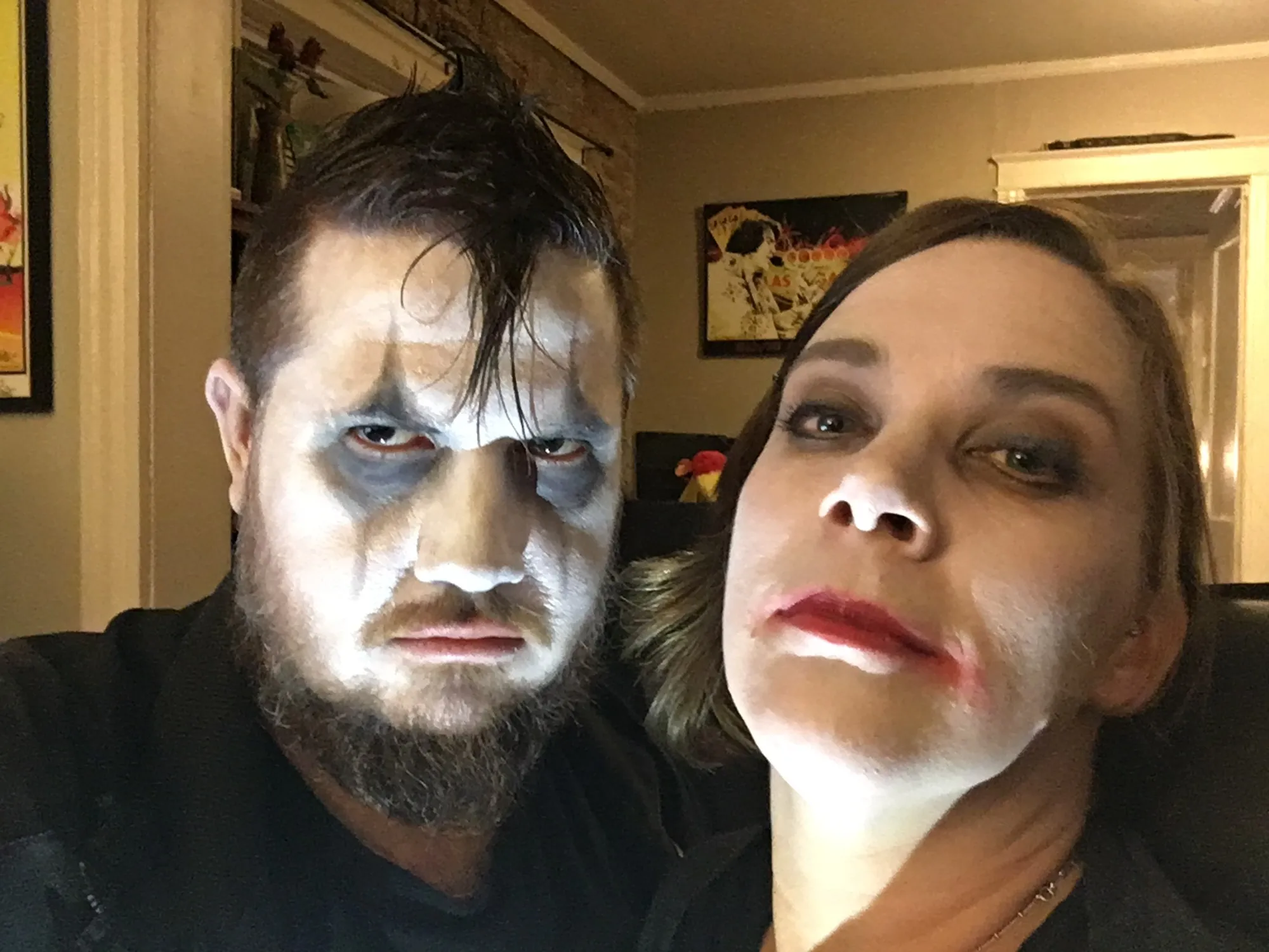 Both of us scowling in white greasepaint and smeared lipstick